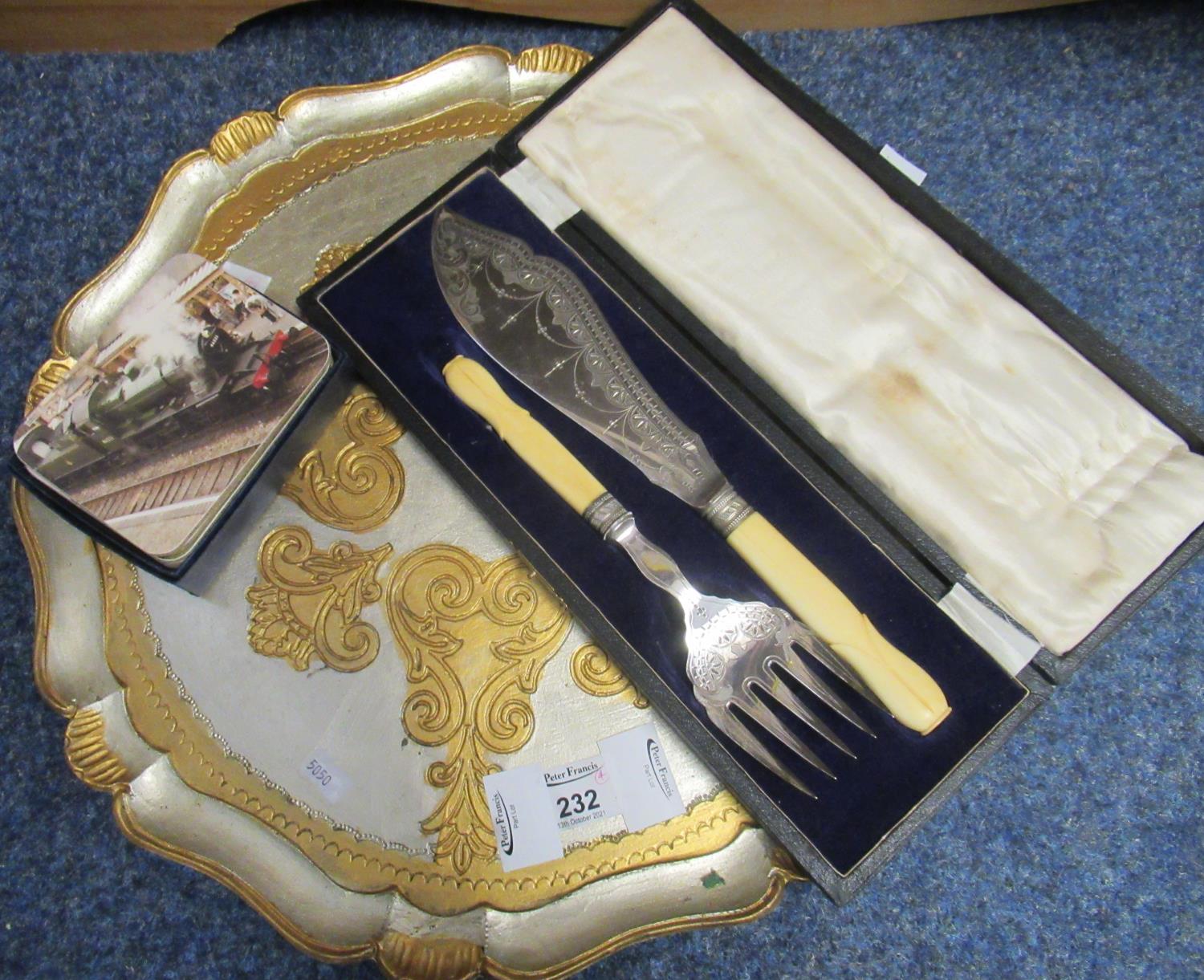 Cased silver plated fork and knife set, together with locomotive placemats, circular silver and gold