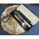 Cased silver plated fork and knife set, together with locomotive placemats, circular silver and gold