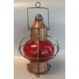 Early 20th Century copper lantern 'For W.M. Harvie & Co Limited, Birmingham' with ruby glass globe