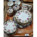 Tray of Victorian part teaware, florally decorated in royal blue, pink, green and gilt on a cream