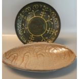 Art pottery slip glazed design stylised foliate charger, impressed marks to the back 1960,