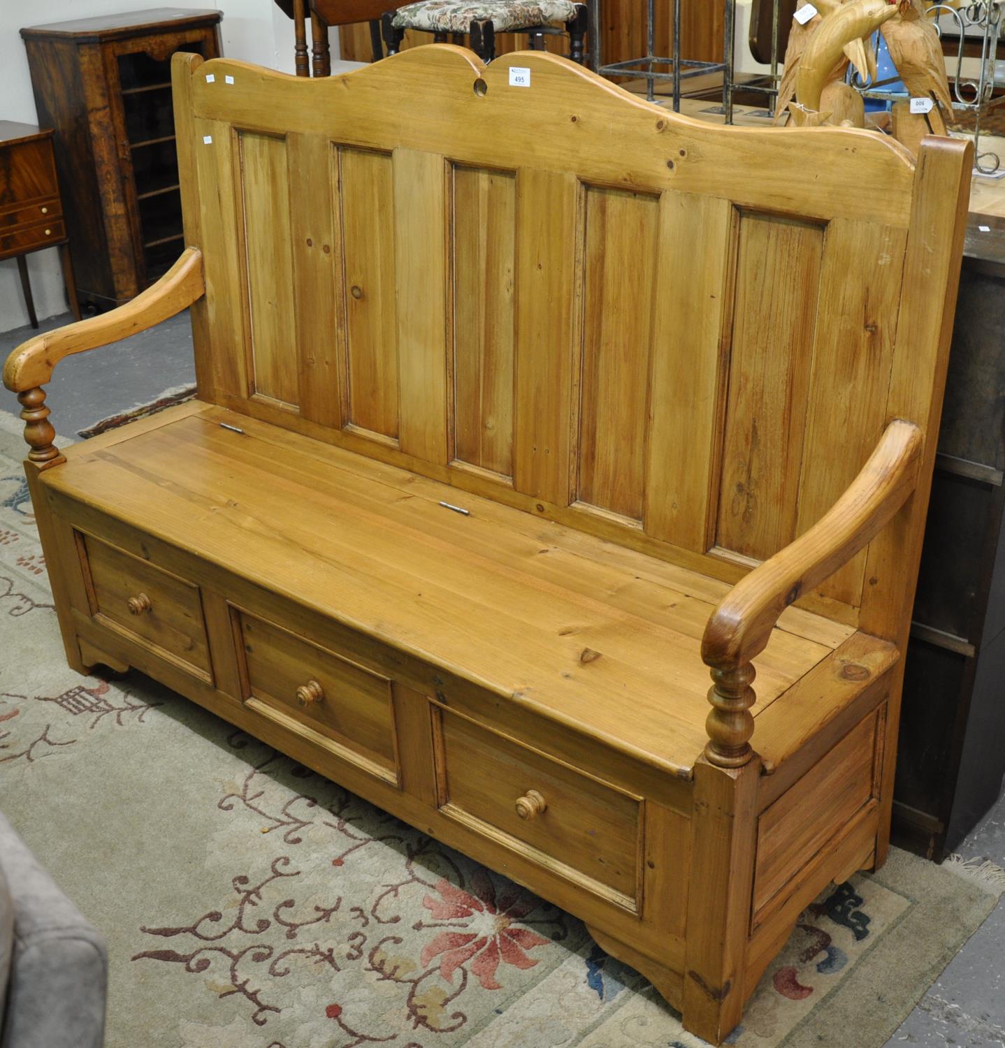 Modern pine high back settle with shaped back and shaped open arms and hinged lid with three dummy