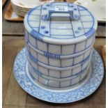 Large blue and white china stilton cheese dome in the shape of a barrel with associate plate. (B.