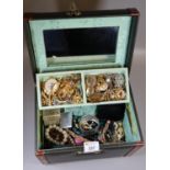 Green leather vanity or jewellery case comprising assorted vintage jewellery to include brooches,