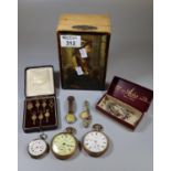 Wooden box with portrait picture, the interior revealing various pocket watches including two gold