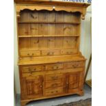 Modern pine two-stage rack-back dresser. (B.P. 21% + VAT)