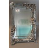 Art Nouveau style silver finish mirror with flowers and figure (modern). (B.P. 21% + VAT)