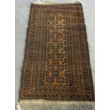 Small Middle Eastern orange ground geometric runner, 138 x 73cm approx. (B.P. 21% + VAT)