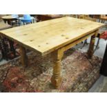 Large modern pine farmhouse kitchen table on baluster turned legs. 182 x 104 x 78 cm approx. (B.P.