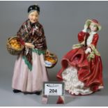 Royal Doulton figurine 'The Orange Lady' HN1759, together with another Royal Doulton figurine 'Top