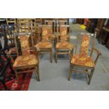 Set of six elm Ercol dining chairs with floral and foliate upholstery, 4 & 2. (6) (B.P. 21 + VAT)