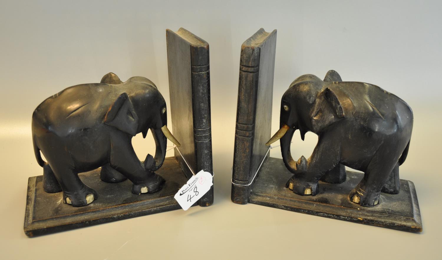 Pair of ebonised bookends in the form of elephants. (B.P. 21% + VAT)