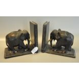 Pair of ebonised bookends in the form of elephants. (B.P. 21% + VAT)
