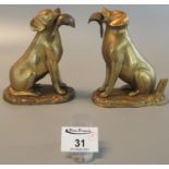 Two matching brass retriever dog ornaments with duck prey. 13.5cm high approx. (2) (B.P. 21% + VAT)