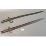 19th Century sword bayonet with brass hilt and cross guard, together with another probably French