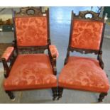 Pair of Edwardian mahogany framed upholstered ladies and gents parlour chairs on ring turned feet