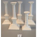 Collection of Royal creamware 'Occasions' Corinthian column candlesticks with relief swag
