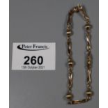 9ct gold fancy link bracelet. Approx weight 5.4 grams.(B.P. 21% + VAT)