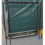 Two similar metal tubular shop fitting clothes racks on wheels. (2) (B.P. 21% + VAT)