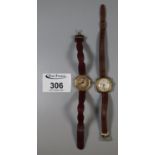 Two 9ct gold ladies wrist watches with leather straps, one marked Dominant. (B.P. 21% + VAT)
