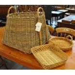 Modern rattan large two handled basket, the interior revealing two other wicker baskets. (B.P. 21% +
