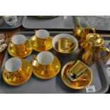 Royal Worcester gold coloured coffee set comprising: coffee pot, milk jug and sugar basin with six