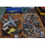 Two trays of play worn Corgi, Dinky and other diecast model airplanes, military planes etc. Together