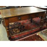 Late Victorian oak two-drawer farm house kitchen table on turned tapering legs. (B.P. 21% + VAT)