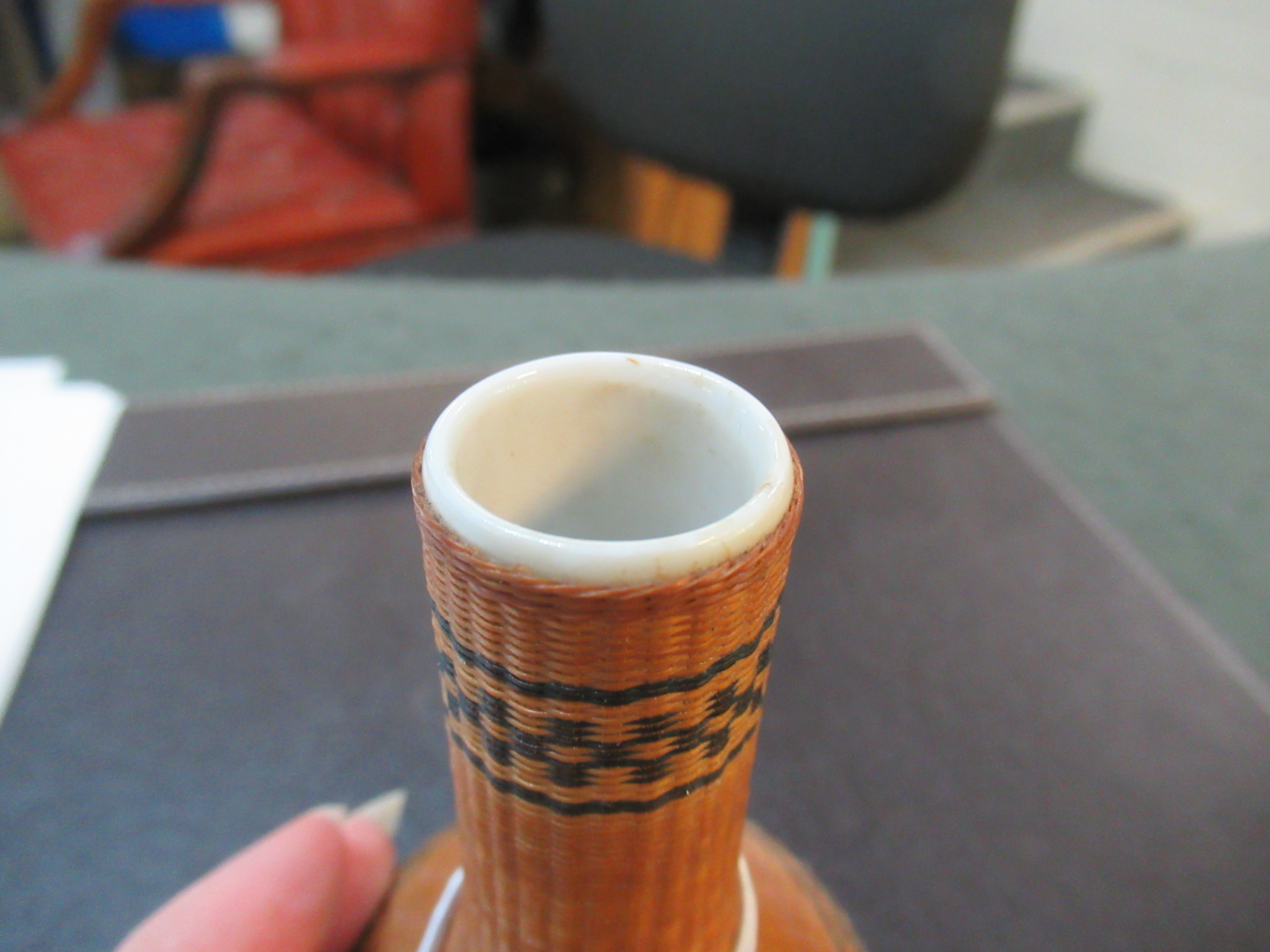 20th Century Chinese porcelain small bottle vase in a woven bamboo decorative cover. (B.P. 21% + - Image 6 of 6