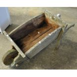 Rustic wooden garden wheelbarrow/planter. (B.P. 21% + VAT)