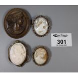 Four cameo brooches.(B.P. 21% + VAT)