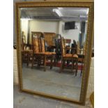 Modern gilt framed bevel plate mirror with moulded leaf decoration. (B.P. 21% + VAT)
