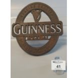 Guinness cast metal advertising teapot stand. (B.P. 21% + VAT)