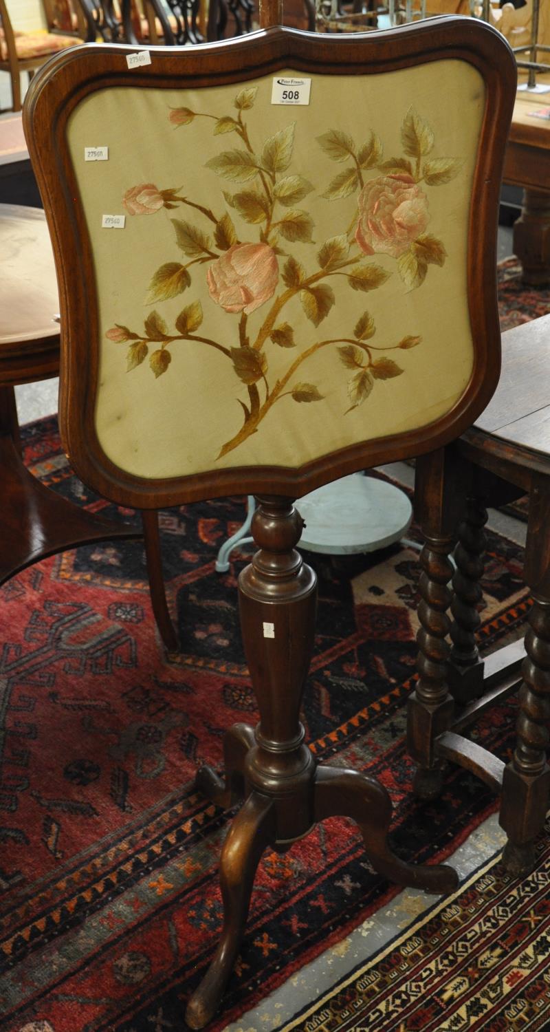 Victorian mahogany shield-shaped pole/ make up screen decorated with silk roses and foliage on a