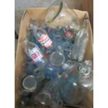 Box containing vintage glass bottles to include; Unigate and CRS milk bottles with advertising,