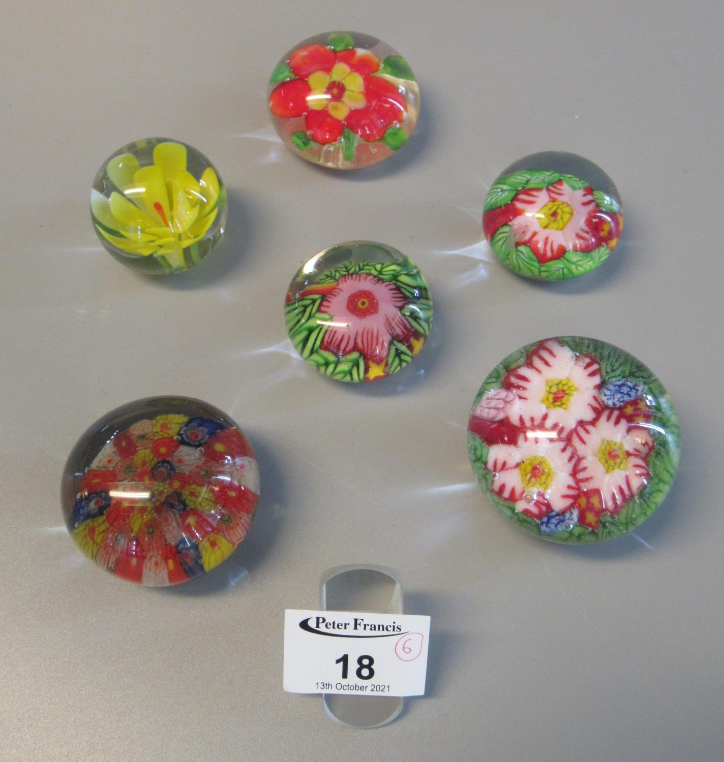 Collection of six French floral glass paperweights (one caned in the style of Clichy). (B.P. 21% +