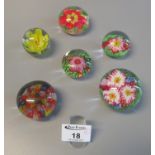 Collection of six French floral glass paperweights (one caned in the style of Clichy). (B.P. 21% +