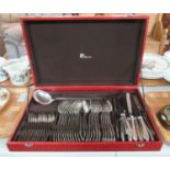 Wooden boxed canteen of cutlery marked Guy Degrenne containing; forks, spoons, teaspoons, ladle,