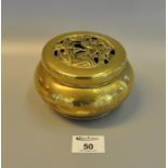 Oriental brass hand warmer or censer with open work lid. Character marks to the base. (B.P. 21% +
