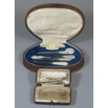Mother of pearl and plastic steal bladed manicure set in leather box, together with another