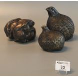 Three brass ornaments in the form of quail and rabbits. (3) (B.P. 21% + VAT)