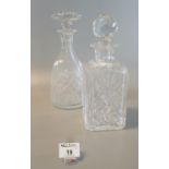 Two cut glass decanters of square section and hob nail form with faceted and mushroom stopper. (