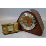 Mid century three train oak art mantel clock, together with a brass alarm clock with Roman face