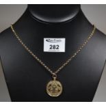 9ct gold medallion, 'Soldiers and Sailors Reception Committee' on a 9ct gold chain with brass clasp.