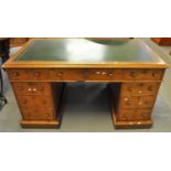 Late Victorian mahogany knee hole desk, the leather and moulded top above three drawers to each