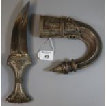 Arab Jambiya type dagger , the sheath and handle with repousse white metal decoration. (B.P. 21% +