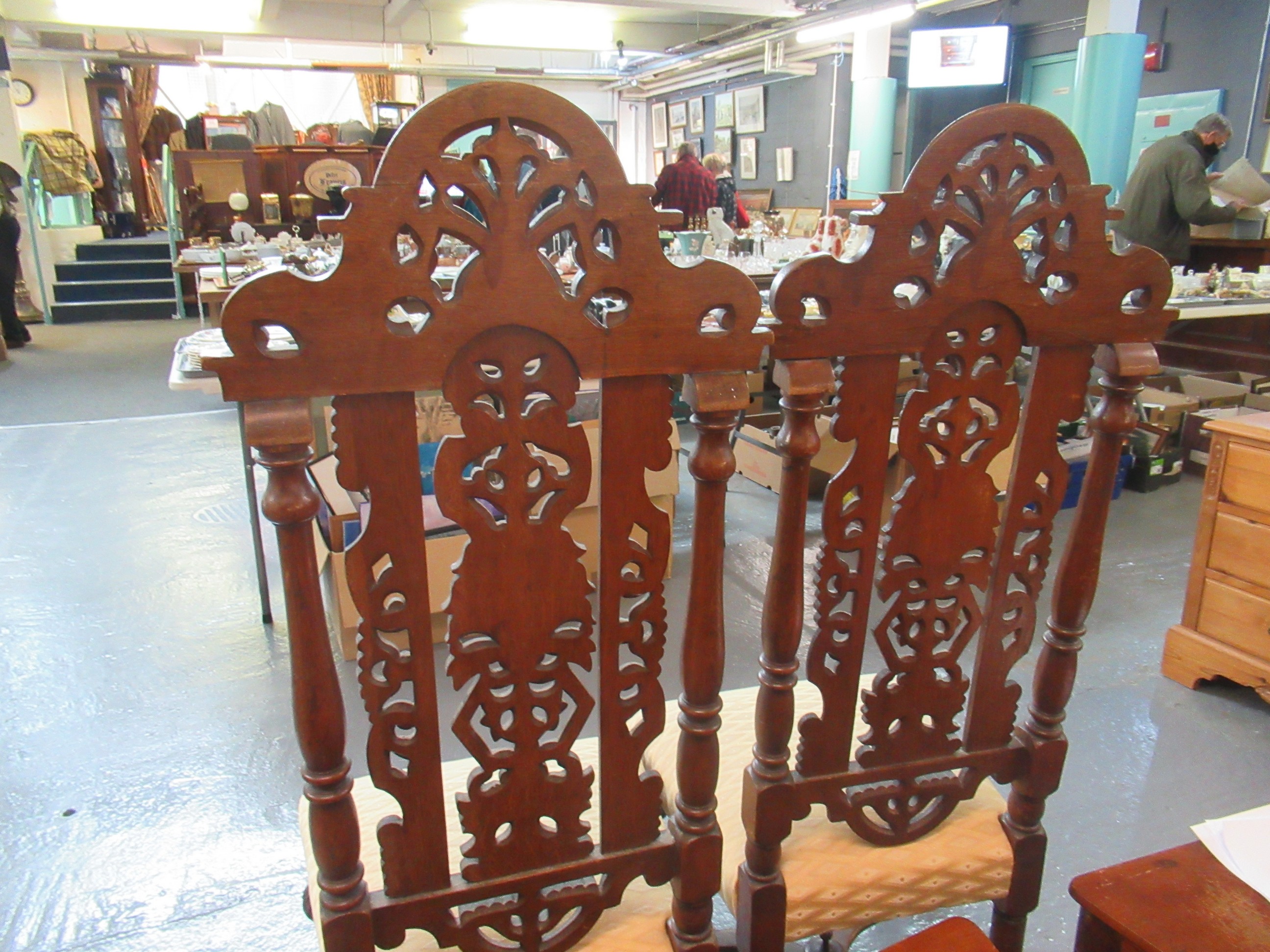 A pair of 20th Century heavily carved high back hall chairs with stuff over seats, standing on - Image 6 of 10