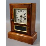 Small American Seth Thomas walnut cased time piece mantel clock with Roman numerals to the face. (