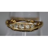 18ct gold and diamond five stone ring. Ring size R. Approx weight 2.9 grams. (B.P. 21% + VAT)