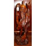 Chinese carved wooden figure of an immortal fisherman on naturalistic base. 62cm high approx. (B.